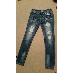 Distressed Almost Famous skinny jeans