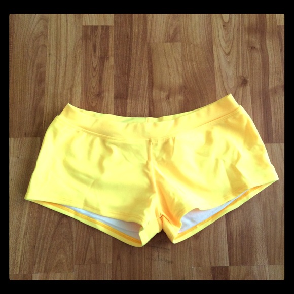 NWOT Yellow boy shorts swimming bottoms