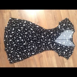 Black ASOS skater dress with heart and bird print.
