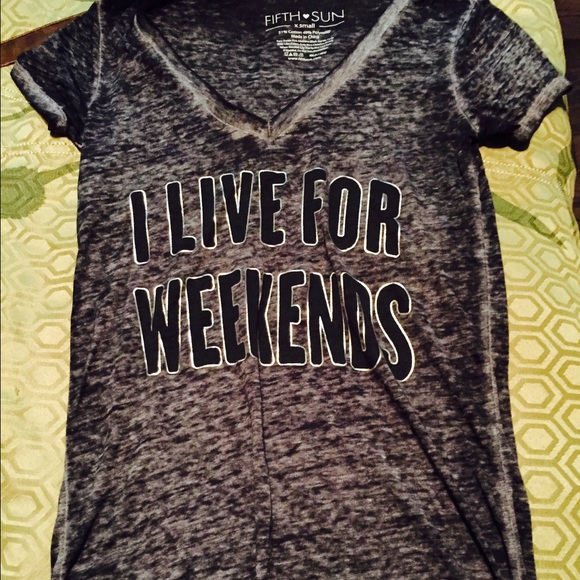 Dark grey shirt.