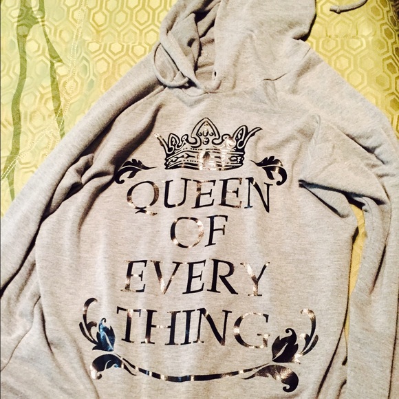 light grey sweater with hood.