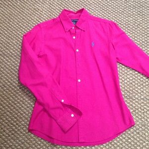 Bright pink button up, long sleeve blouse.