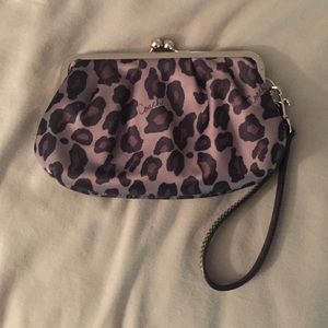 Small coach clutch with leopard print