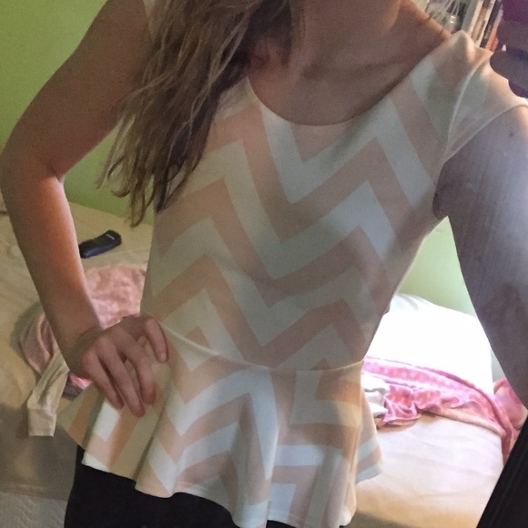 Peplum shirt.
