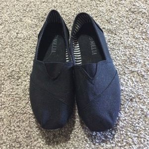 Black canvas slip on shoes