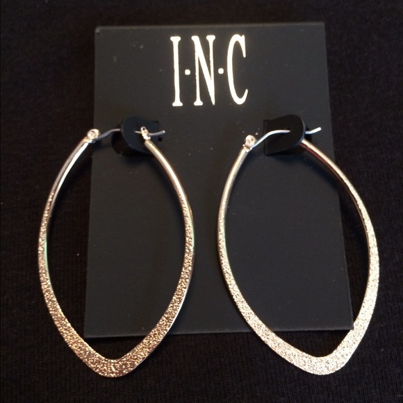 Gold drop earring .sold