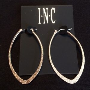 Gold drop earring .sold