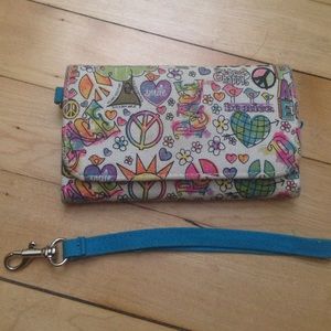 tri- fold wallet with attachable wrist strap