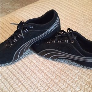 PUMA black suede sneakers