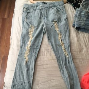 Distressed light wash jeans