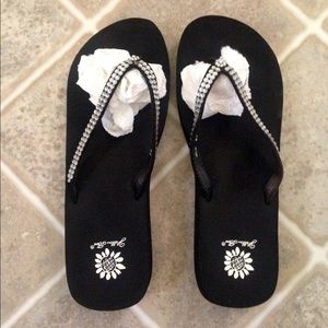 Yellow box flip flops