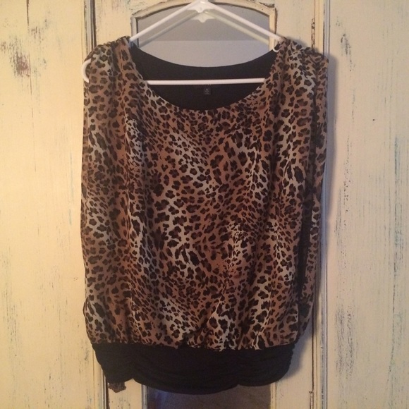 Sheer cheetah sleeveless blouse