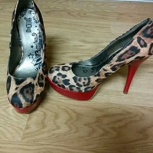 Trash leopard heels with red heel and platform