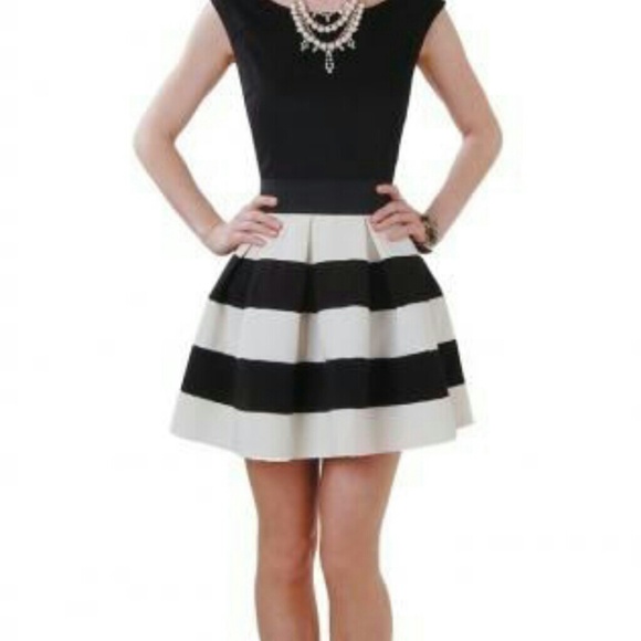 Recreate this look. Gap tan & white striped skirt