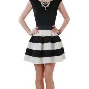 Recreate this look. Gap tan & white striped skirt
