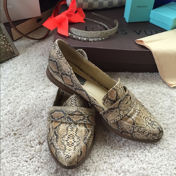 snake print loafers.
