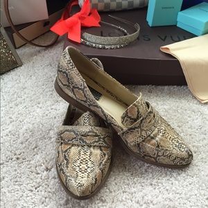 snake print loafers.