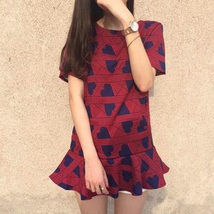 Red dress with blue hearts