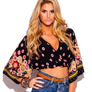 Kimono style crop top in black and gold.