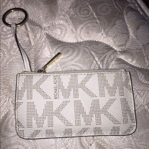 Michael Kors coin purse with key ring.
