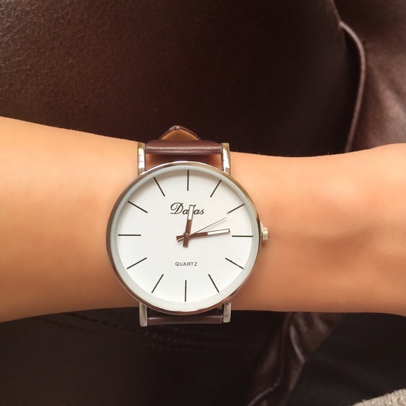 Silver watch with brown band. BRAMD NEW!