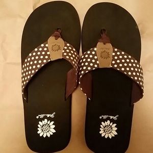 Brown polka dot flip flops