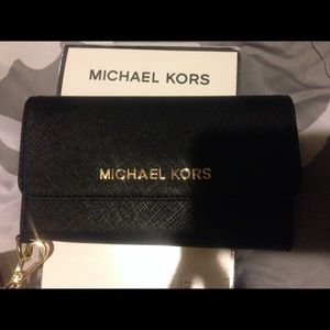 SOLD Michael kors cell phone wallet