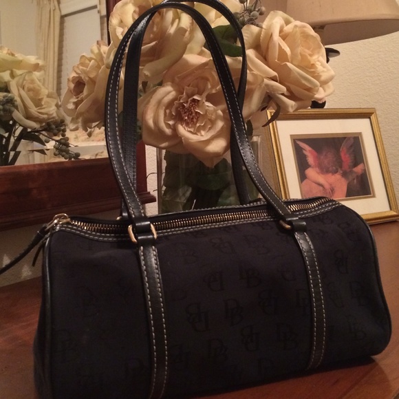 Dooney and Bourke barrel bag in black.