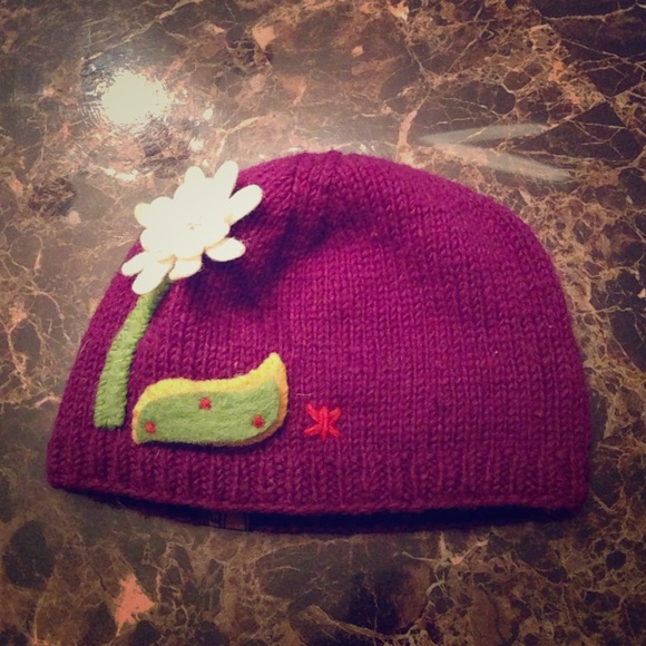Purple wool hat with flower design