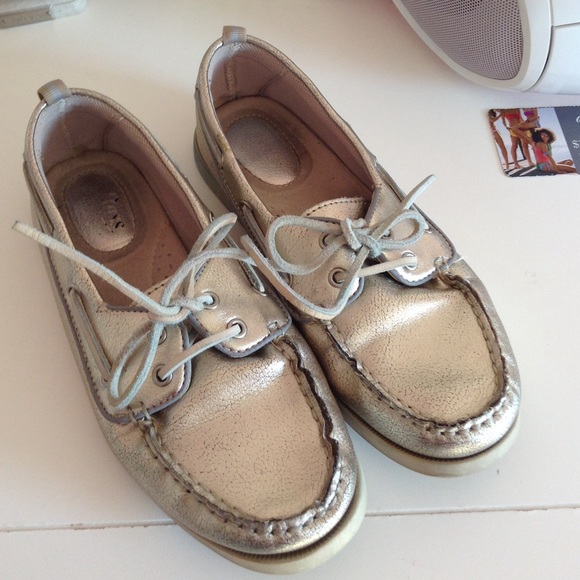 Bass boat shoes in a pewter/ goldish tone