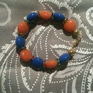 Handmade bracelet blue, orange, gold plated beads