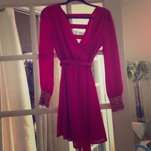 I am selling a long sleeve magenta dress.