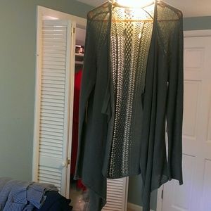 A green cardigan