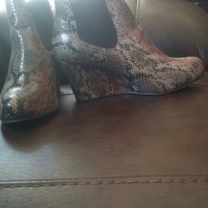 Snakeskin wedge booties