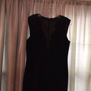 Black sleeveless sheath dress