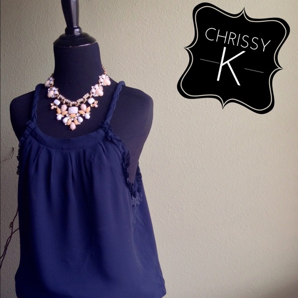 Halter blouse with ruffle.