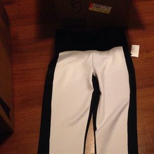 Black pants striped with white