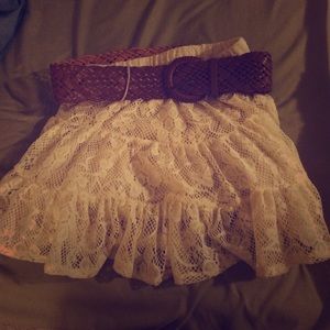 Off-white lace skirt with leather belt