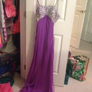 Floor length purple sparkle formal dress.
