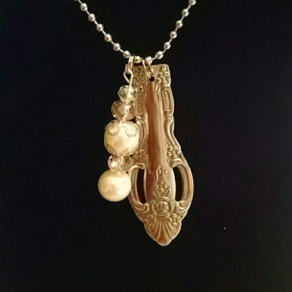 Hold for Noel.      Flatware necklace