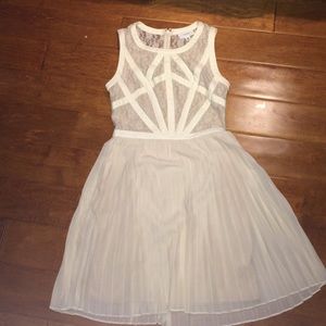 Cream lace and leather dress
