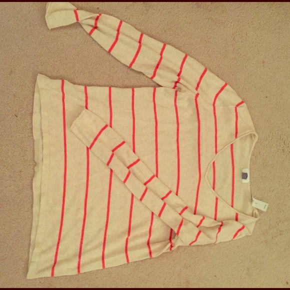Cream and pink stripped v-neck sweater.