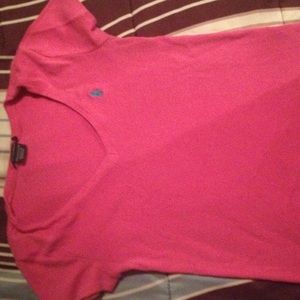Pink shirt , blue horse. Polo
