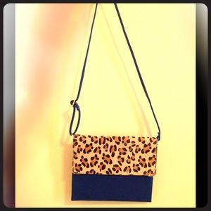 blue and leopard purse