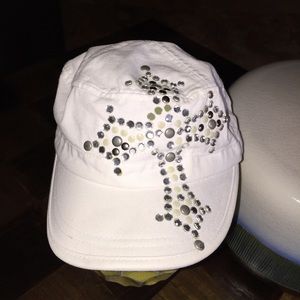 White adjustable baseball cap with studded cross!