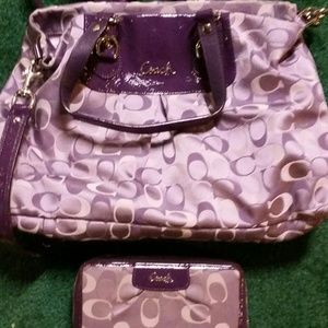 Purple coach purse and wallet