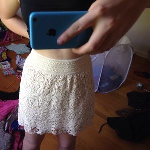 Off white lace skirt.