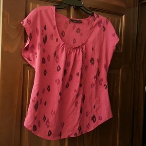 Pink cheetah print dress shirt.