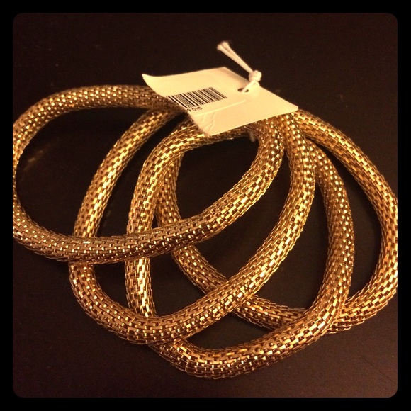 Gold statement bracelets