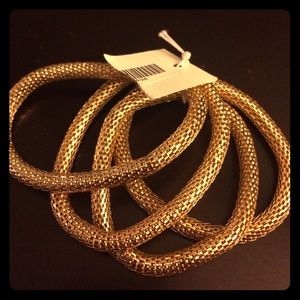 Gold statement bracelets